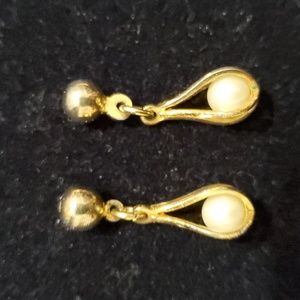 Delicate caged pearl stud earrings